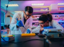 Man and woman working in a lab