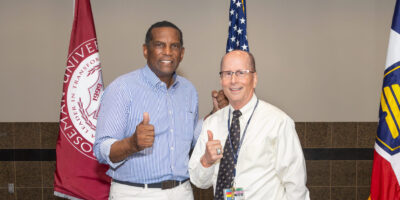 Dr. James Hupp poses with Representative Burgess Owens